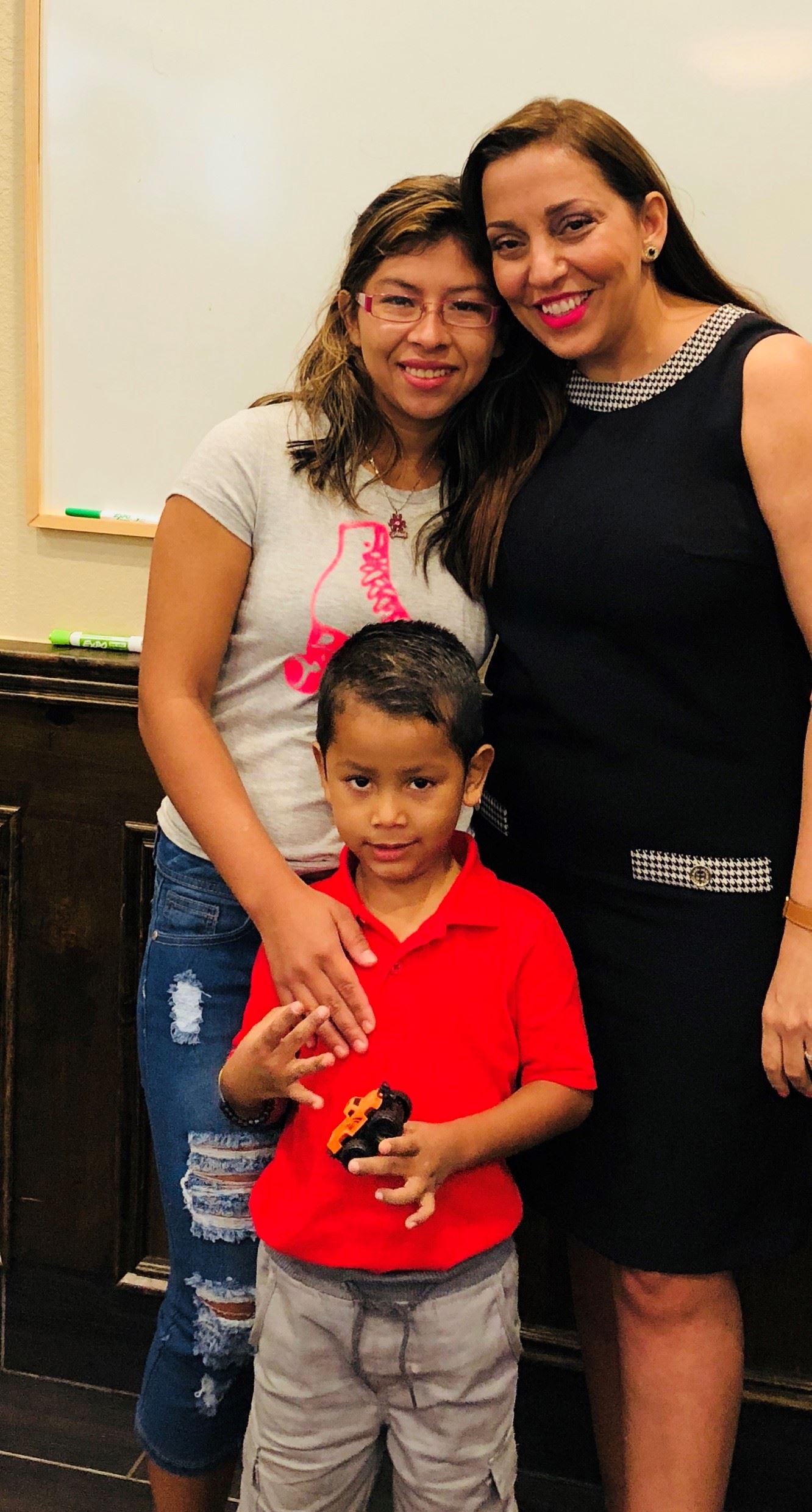 Attorney Mana Yegani with Liliana Martinez and her 5-year-old son after reunification